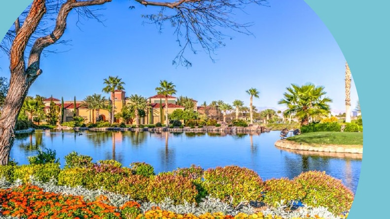 Trees and greenery surrounding a pond on the grounds of Siena in Las Vegas, Nevada.