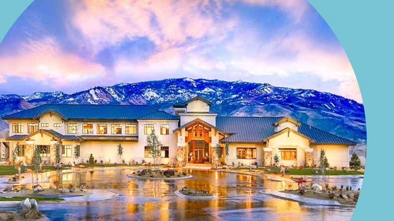 Sunset over the mountains and clubhouse at Sierra Canyon in Reno, Nevada.