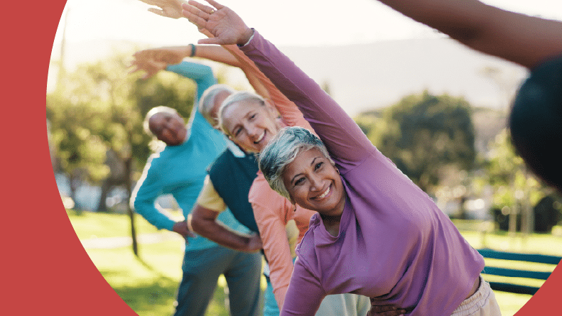 A stretching class for 55+ people in a city park.
