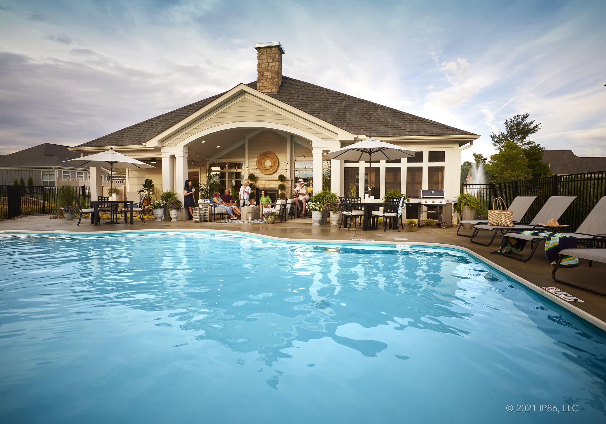 Resort-style outdoor pool and clubhouse gathering space