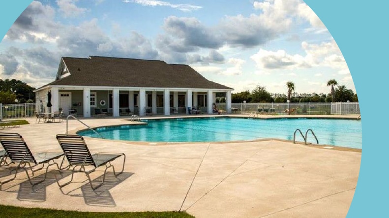 Lounge chairs beside the outdoor pool at Cameron Village in Myrtle Beach, South Carolina.