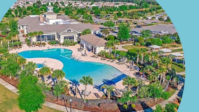 Aerial view of the outdoor pool and amenities at Del Webb at Cane Bay in Summerville, South Carolina.