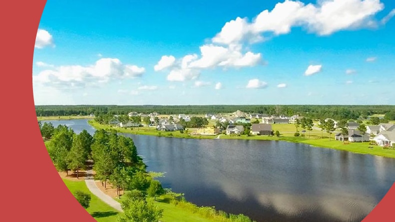 Aerial view of homes beside a pond at Hilton Head Lakes in Hardeeville, South Carolina.