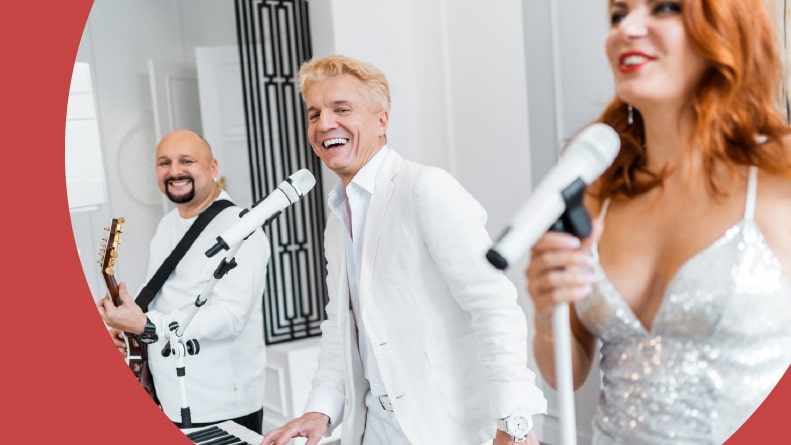 A jazz band of three people perform and sing their songs