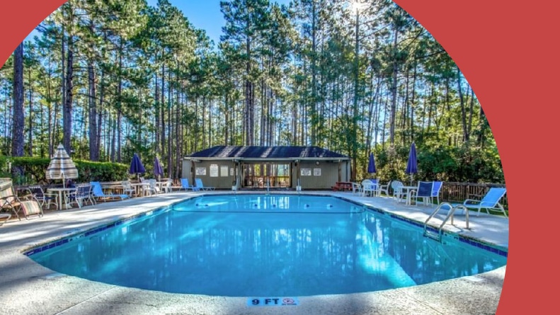 Lounge chairs beside the outdoor pool at Myrtle Trace in Conway, South Carolina.