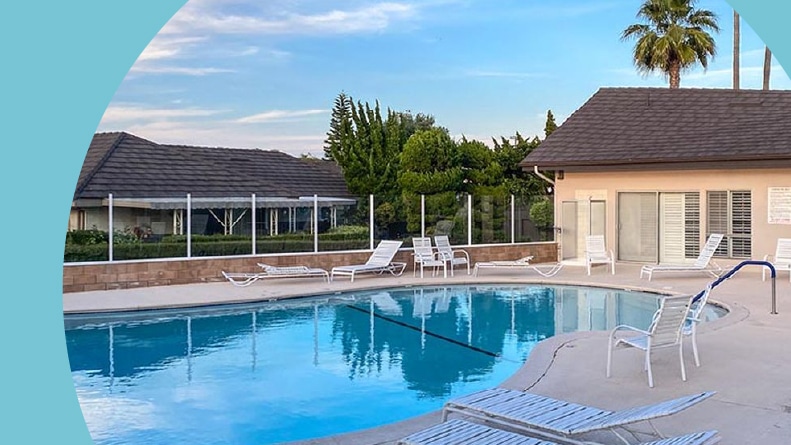 Lounge chairs surrounding the outdoor pool at New Horizons South Bay in Torrance, California.