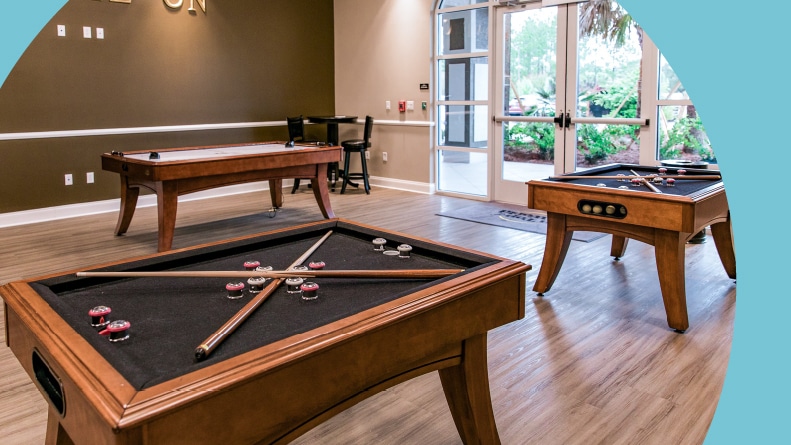 Bumper pool and air hockey tables at On Top of the World in Ocala, Florida.