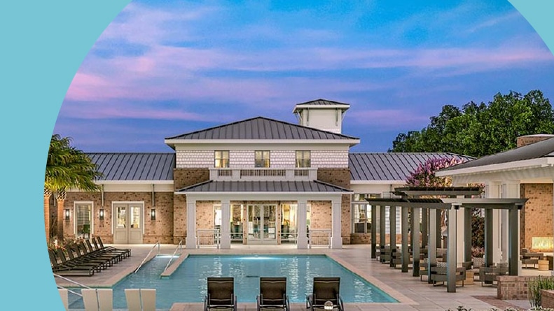 Lounge chairs beside the outdoor pool at Overture West Ashley in Charleston, South Carolina.
