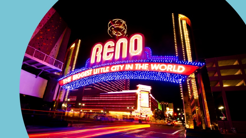 "The biggest little city in the world" sign lit up at night in Reno, Nevada.