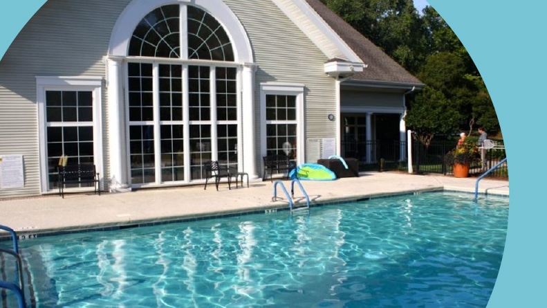The outdoor pool outside the clubhouse at The Elms of Charleston in Charleston, South Carolina.