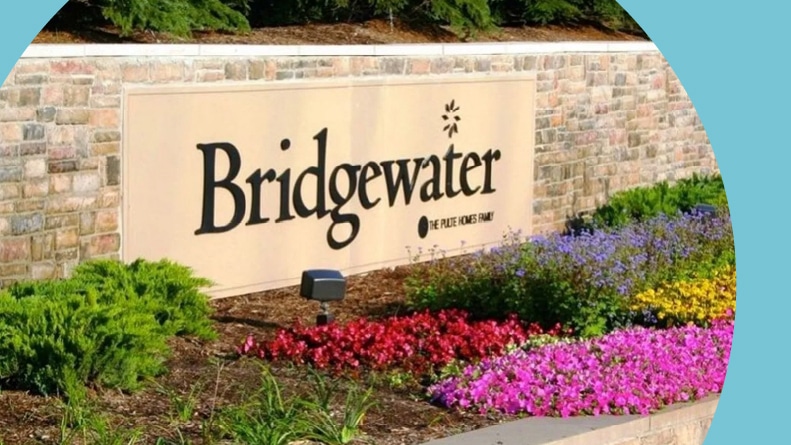 Flowers surrounding the community sign for Bridgewater in Brownstown, Michigan.