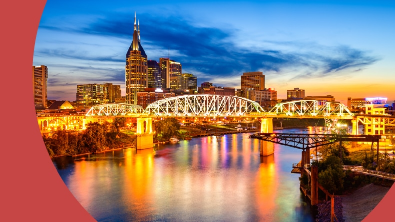 The downtown city skyline in Nashville, Tennessee at night.