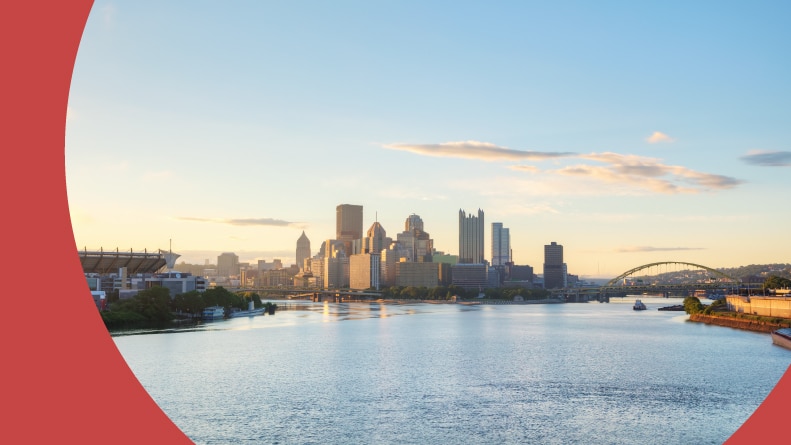 View of the Pittsburgh cityscape across the Ohio river in the morning.