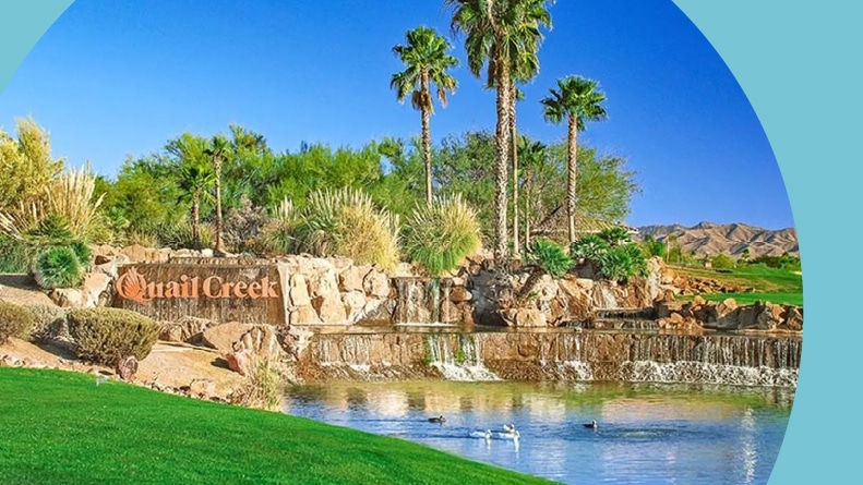 The community sign beside a pond on the golf course at Quail Creek in Green Valley, Arizona.