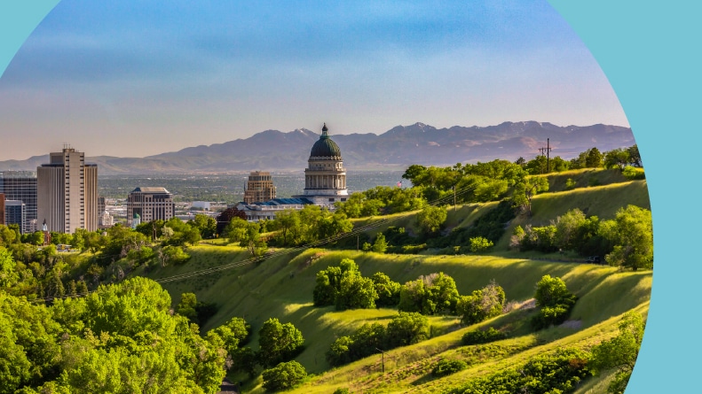 Rolling hills beside Salt Lake City with a view of the capitol building dome.