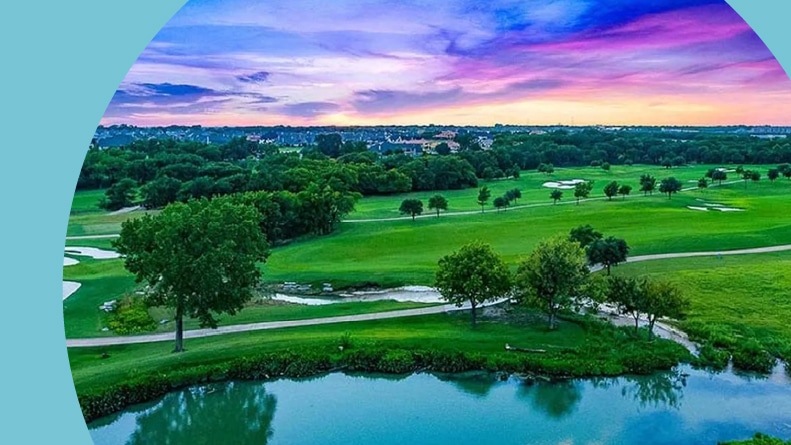 Aerial view of a golf course at sunset within The Retreat at Craig Ranch in McKinney, Texas.