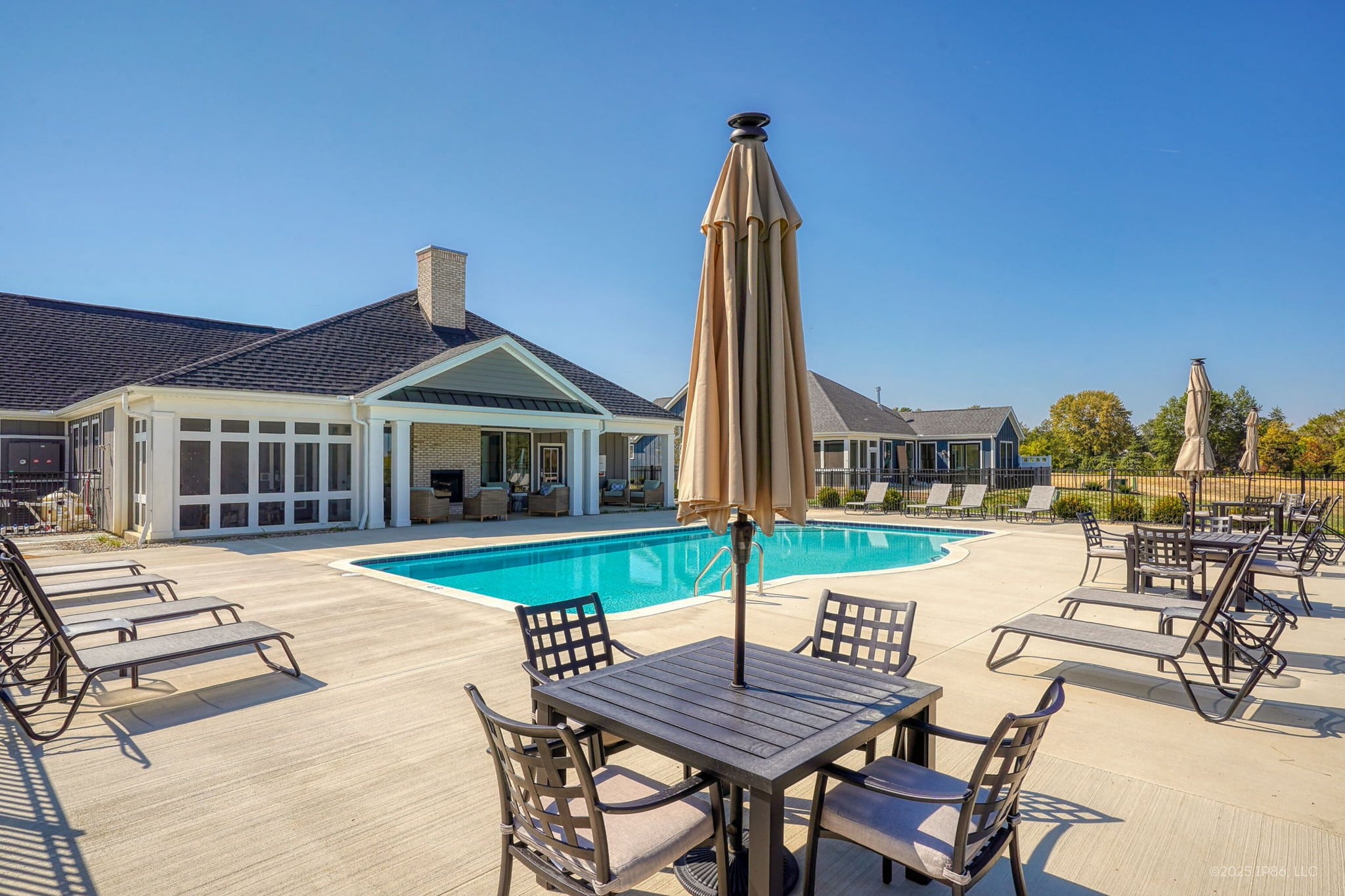 Pool with clubhouse seating