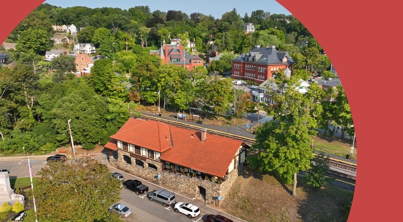 Aerial view of the historic town center and train station in Belmont, Massachusetts.