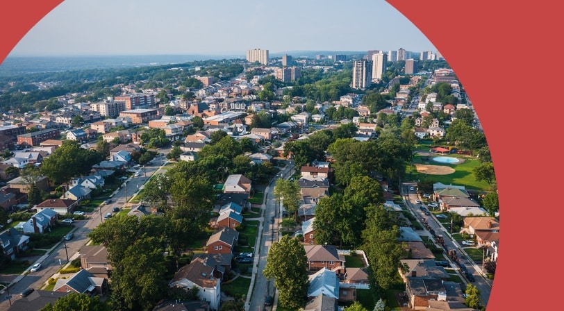 Aerial of Fort Lee, New Jersey and the New York City skyline in the distance.