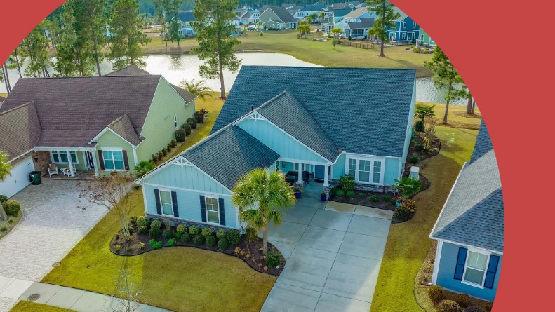 Aerial view of a residential street at Four Seasons at The Lakes of Cane Bay in Summerville, South Carolina.
