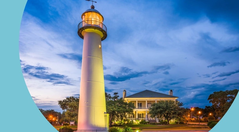 The small lighthouse in Biloxi, Mississippi at sunset.