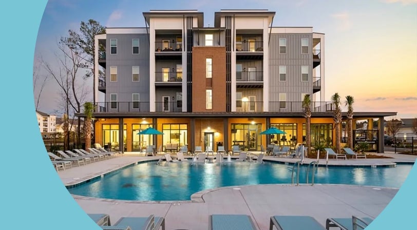 Lounge chairs surrounding the outdoor pool at Restore at Carolina Park, a 55+ rental community in Mt Pleasant, South Carolina.
