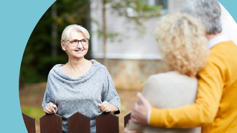 A retired couple speaking to a 55+ community resident about the neighborhood.