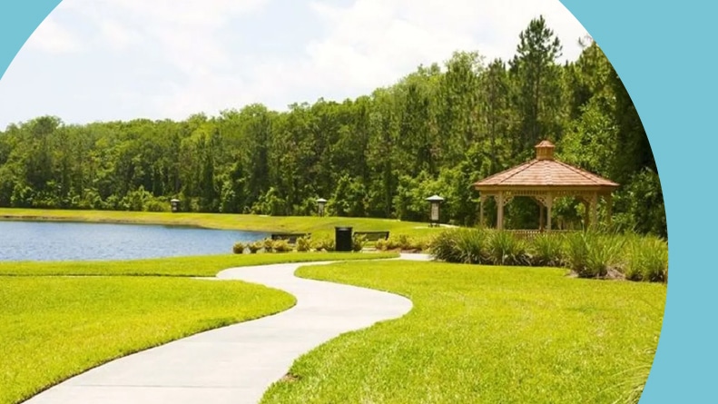 A pathway beside a gazebo and pond on the grounds of Del Webb Ponte Vedra, a 55+ community in Ponte Vedra, Florida.