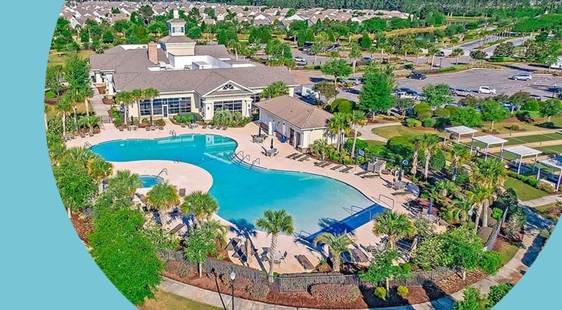 Aerial view of the clubhouse and pool at Del Webb at Cane Bay, a 55+ community in Summerville, South Carolina.