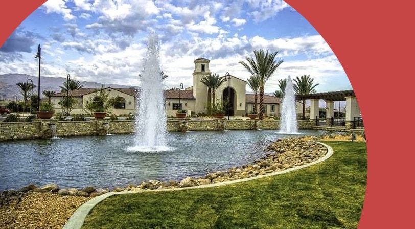 Fountain and clubhouse at Four Seasons at Terra Lago, a 55+ community in Indio, California.