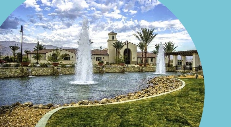 Fountain and clubhouse at Four Seasons at Terra Lago, a 55+ community in Indio, California.