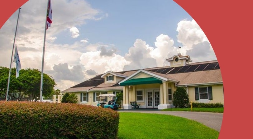 Clubhouse exterior at Pennbrooke Fairways, a 55+ community in Leesburg, Florida.