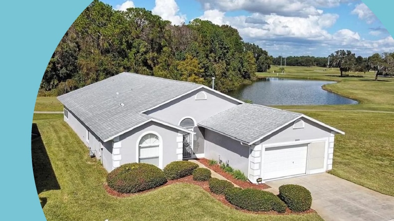 Aerial view of a house in Pennbrooke Fairways, a 55+ community in Leesburg, Florida.