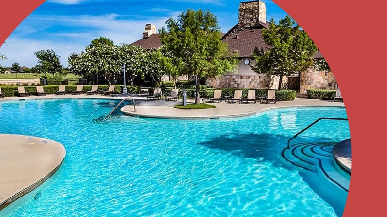 Trees surrounding the outdoor pool at Robson Ranch – Texas in Denton, Texas.