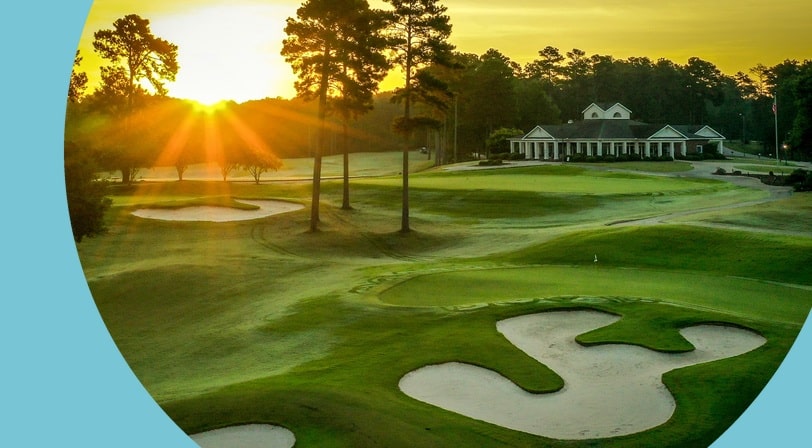 Sunrise over the golf course and clubhouse at Savannah Lakes Village, a 55+ community in McCormick, South Carolina.