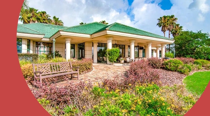Clubhouse exterior at Spruce Creek Country Club, a 55+ community in Summerfield, Florida.