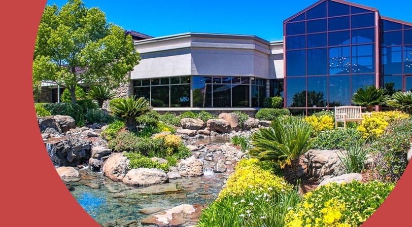 Clubhouse and landscaped water feature at Sun City Lincoln Hills, a 55+ community in Lincoln, California.