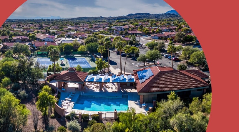 Aerial view of the pool, tennis, and pickleball courts at Sun City Oro Valley, a 55+ community in Oro Valley, Arizona.