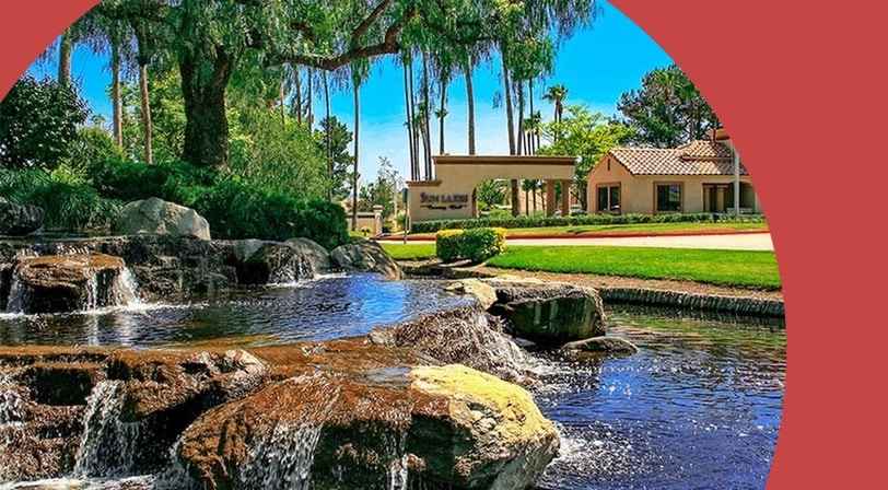Waterfall and clubhouse at Sun Lakes Country Club, a 55+ community in Banning, California.