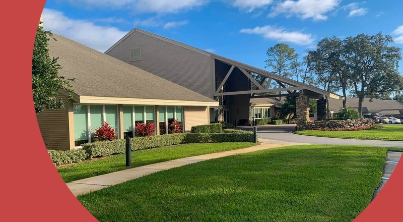 Clubhouse exterior at Timber Pines, a 55+ community in Spring Hill, Florida.