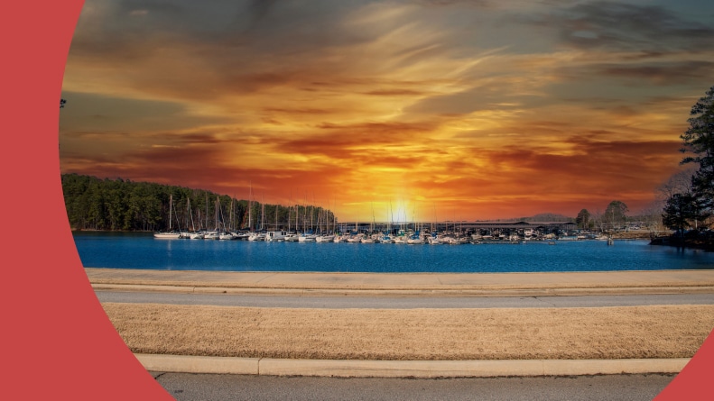 Boats and yachts docked in the marina on Lake Lanier at sunset in Gainesville, Georgia.