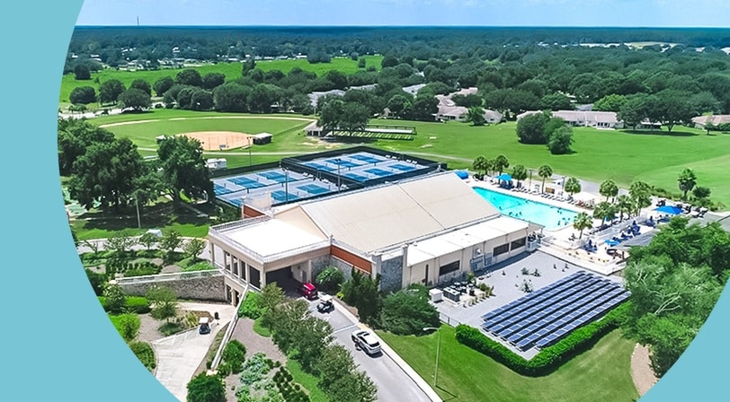 Aerial view of the recreation center and pool complex at On Top of the World, a 55+ community in Ocala, Florida.