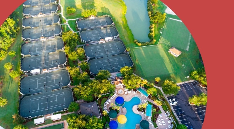 Aerial view of the tennis courts and pool complex at Sun City Hilton Head, a 55+ community in Bluffton, South Carolina.