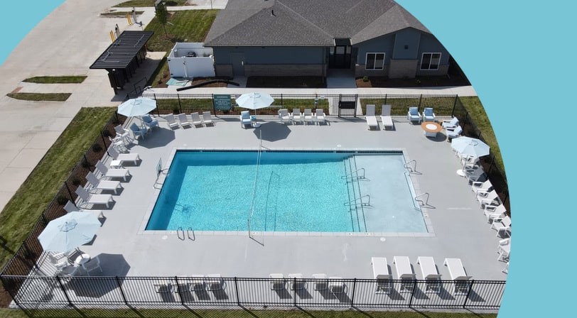 An aerial view of the pool and clubhouse at The Collection at Gretna Landing, a 55+ community in Gretna, Nebraska.
