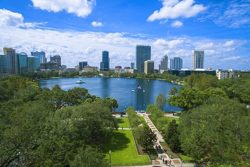 An aerial view of Lake Eola on a sunny day in Orlando, Florida