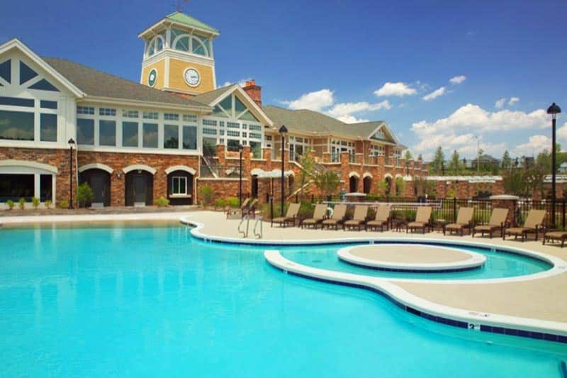 carolina-preserve-cary-north-carolina Lounge chairs surrounding the outdoor pool at Carolina Preserve in Cary, North Carolina.