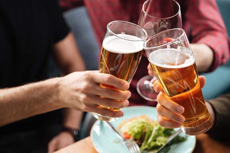 fine-dining-in-a-55+-community Friends enjoying some beer at a casual restaurant in a 55+ community.