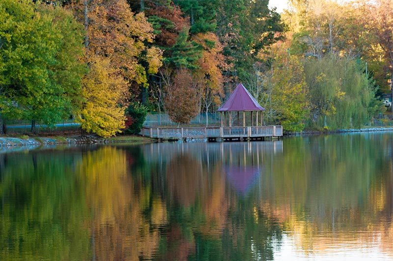 flat-rock-north-carolina A dock on a peaceful lake on the grounds of Connestee Falls, a 55+ community in Brevard, North Carolina.