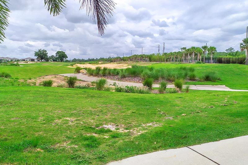 The golf course on a cloudy day at Four Seasons at Orlando, a 55+ community in Kissimmee, Florida.