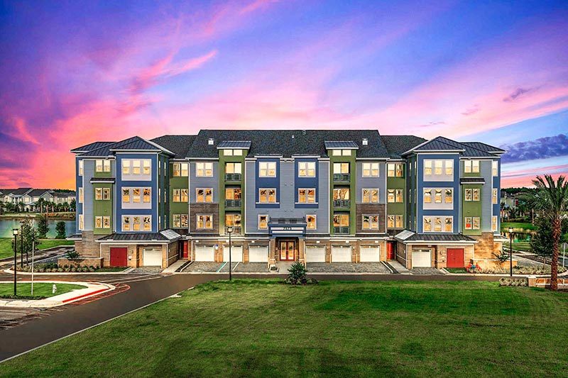 Exterior view of a residential building at Gatherings of Lake Nona, a 55+ community in Orlando, Florida